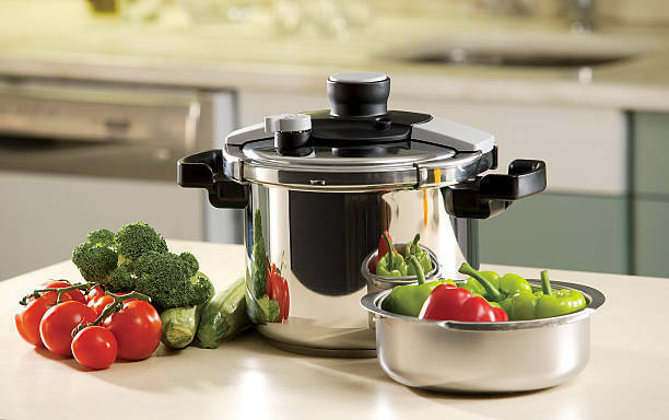 pressure cooker and vegetables in the kitchen